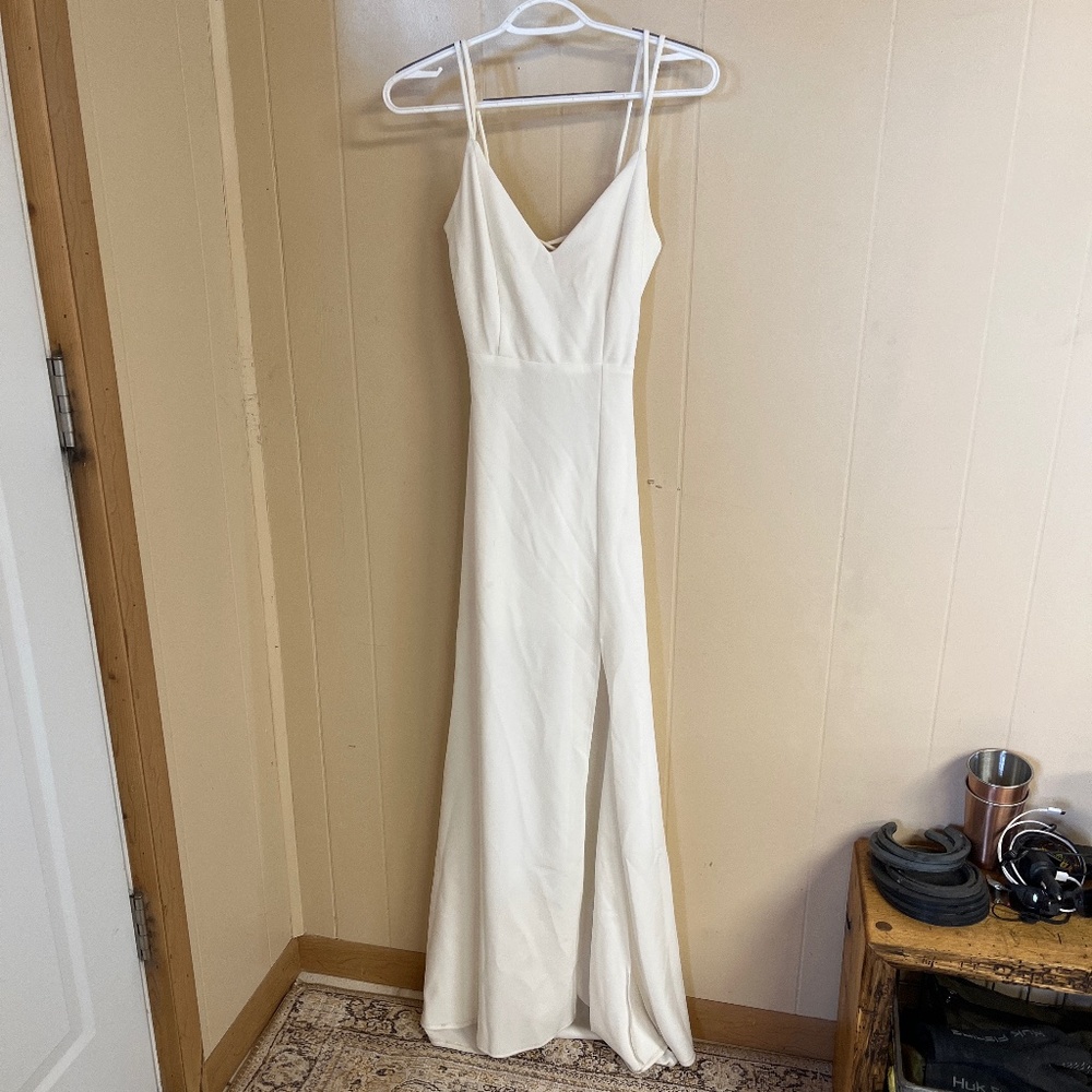 White fitted dress with slit